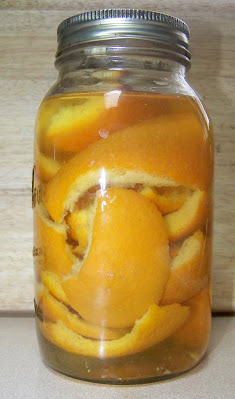 Orange peels in jar of vinegar