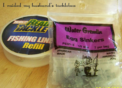 I decided to use fishing line to string the buttons and sinkers to weight them down.